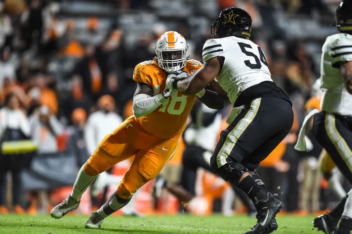 Tennessee Volunteers defensive lineman Ja'Quain Blakely (48) rushes around Vanderbilt Commodores offensive lineman Tyler Steen (54) during the second half at Neyland Stadium.